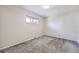 Neutral bedroom with a carpeted floor, window, baseboard heater, and ceiling light at 951 Tennyson St, Denver, CO 80204