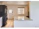 Bright kitchen featuring modern appliances and a stylish countertop at 951 Tennyson St, Denver, CO 80204