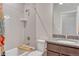 Bathroom with a shower-tub combination, white subway tile, and granite vanity at 692 Sage Forest Ln, Monument, CO 80132