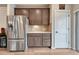 Well-equipped kitchen with stainless steel appliances and granite countertops at 692 Sage Forest Ln, Monument, CO 80132