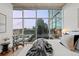 Bedroom featuring a city view, hardwood floors, and a zebra-striped chair at 1700 Bassett St # 1612, Denver, CO 80202