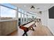 Fun game room with shuffleboard and great views from floor to ceiling windows at 1700 Bassett St # 1612, Denver, CO 80202