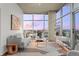 Bright living room featuring city views, modern furnishings and a stylish area rug at 1700 Bassett St # 1612, Denver, CO 80202