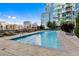 Beautiful outdoor swimming pool with lounge chairs and skyline views at 1700 Bassett St # 1612, Denver, CO 80202