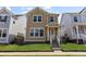 Charming two-story home with a well-manicured lawn and inviting front entrance and stairs at 245 Washington St, Erie, CO 80516