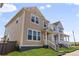 Charming two-story home with a well-manicured lawn and inviting front entrance and stairs at 245 Washington St, Erie, CO 80516
