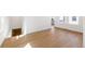 Spacious and bright living room with laminate flooring and staircase at 245 Washington St, Erie, CO 80516