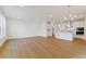 Bright and airy living room featuring recessed lighting and beautiful hardwood floors at 245 Washington St, Erie, CO 80516
