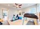 Functional home gym features a treadmill, exercise bike, and ample space for a complete workout at 19755 W 57Th Cir, Golden, CO 80403