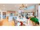 Open floor plan combines kitchen, dining, and living areas for easy entertaining at 19755 W 57Th Cir, Golden, CO 80403