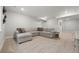 Finished basement featuring plush carpet, neutral walls and comfortable seating area for relaxing and entertaining at 5108 N Quatar St, Aurora, CO 80019