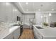 Beautiful kitchen with stainless steel appliances, spacious countertops, and stylish backsplash at 5108 N Quatar St, Aurora, CO 80019