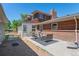 Spacious backyard patio offers a lovely outdoor seating area for relaxation at 8836 Marathon Rd, Longmont, CO 80503