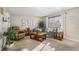 Inviting living room with soft natural light, comfortable seating, and decorative accents for a cozy atmosphere at 9731 W Polk Dr, Littleton, CO 80123