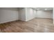 Finished basement with vinyl flooring and recessed lights at 308 Oswego St, Aurora, CO 80010