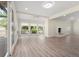 Bright living room with large windows and cozy fireplace at 308 Oswego St, Aurora, CO 80010