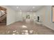 Open floor plan with cozy fireplace and wood-style laminate flooring at 308 Oswego St, Aurora, CO 80010