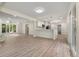 Spacious open floor plan with eat-in kitchen and wood-style laminate flooring at 308 Oswego St, Aurora, CO 80010