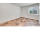 Finished basement rec room with tile floor at 5023 Goshawk Ct, Brighton, CO 80601