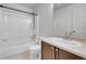 Bathroom with tub-shower, vanity, and toilet at 5023 Goshawk Ct, Brighton, CO 80601