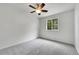 Bedroom with neutral walls, carpeting, and window at 5023 Goshawk Ct, Brighton, CO 80601