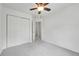 Bedroom with a closet, ceiling fan and ensuite bathroom at 5023 Goshawk Ct, Brighton, CO 80601