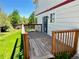Beautiful wooden deck with great views of the yard and natural lighting at 5023 Goshawk Ct, Brighton, CO 80601