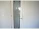 Pantry door with glass insert and decorative design at 5023 Goshawk Ct, Brighton, CO 80601