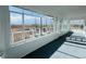 Enclosed porch offers panoramic views of surrounding landscape at 17362 County Road 29, Platteville, CO 80651