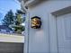 Exterior garage light fixture with house number at 1130 Locust St, Denver, CO 80220