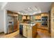 Spacious kitchen featuring stainless steel appliances and ample cabinet space at 761 Carr St, Lakewood, CO 80214