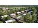 Aerial view of a neighborhood highlighting its greenery, houses, and community layout at 1242 S Crystal Way, Aurora, CO 80012