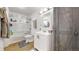 Bathroom with shower-tub combination and white vanity at 1242 S Crystal Way, Aurora, CO 80012