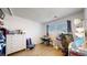 Bedroom with desk and large window at 1242 S Crystal Way, Aurora, CO 80012