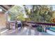 View of deck space with grill, railing, and outdoor setting at 1242 S Crystal Way, Aurora, CO 80012
