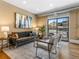 Inviting living room features modern decor, comfortable seating, and large windows with city views at 740 N Sherman St # 208, Denver, CO 80203