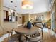 Open-concept living space with a dining area and a cozy seating area at 740 N Sherman St # 208, Denver, CO 80203