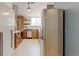 Well-equipped kitchen with stainless steel appliances, custom backsplash, and ample storage at 11358 W 85Th Pl # E, Arvada, CO 80005