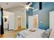 Spacious primary bedroom with an ensuite bathroom, ample natural light, vaulted ceiling and tasteful design, creating a private sanctuary at 11358 W 85Th Pl # E, Arvada, CO 80005