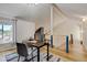 Bright office space featuring a modern work space and hardwood flooring at 11358 W 85Th Pl # E, Arvada, CO 80005