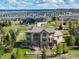 Aerial view of the property featuring manicured landscaping and mountain views at 5409 Sedona Dr, Parker, CO 80134