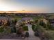 Captivating dusk view of home showcasing golf course frontage and surrounding community at 5409 Sedona Dr, Parker, CO 80134