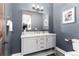 Elegant powder room with stylish fixtures, vanity, and contemporary decor at 5409 Sedona Dr, Parker, CO 80134