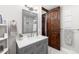 Charming bathroom with a modern vanity, elegant decor, and marble tile flooring, creating a luxurious feel at 5409 Sedona Dr, Parker, CO 80134