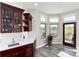 Bright breakfast nook with large windows offering scenic outdoor views and access to the deck at 5409 Sedona Dr, Parker, CO 80134