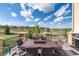 Deck with outdoor seating and table. Perfect for backyard barbecues and entertaining at 5409 Sedona Dr, Parker, CO 80134