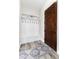 Functional mudroom with bench seating, storage hooks, and convenient access to the home at 5409 Sedona Dr, Parker, CO 80134