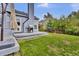 The large backyard features a deck, grill, and plenty of space for outdoor enjoyment at 14430 W Yale Pl, Lakewood, CO 80228