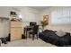 Well-lit bedroom with a work area, offering a quiet space for work or study at 3423 S Glencoe St, Denver, CO 80222