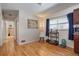 Bright dining area with hardwood floors and a modern bar, perfect for entertaining at 3423 S Glencoe St, Denver, CO 80222